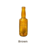 Botella de cerveza marrón con pelota